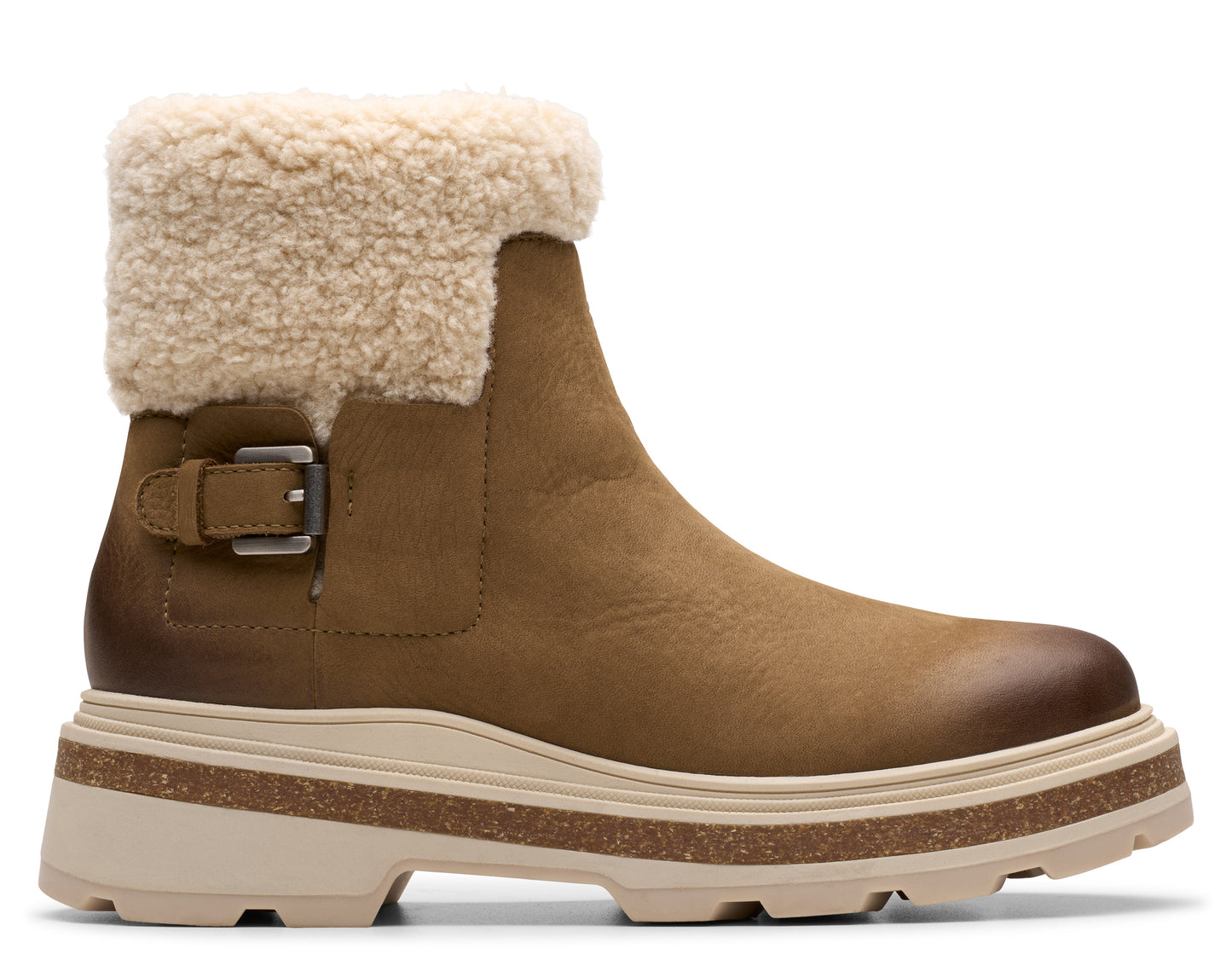 Ankle-high, light brown boot with a fuzzy, light-colored cuff, and a buckled strap near the ankle, resting on a thick, layered sole.