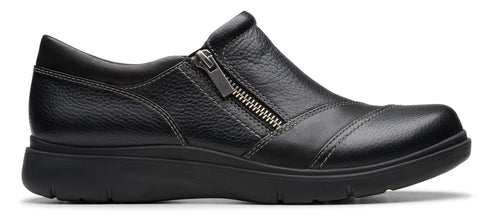 A black leather slip-on shoe with a side zipper.