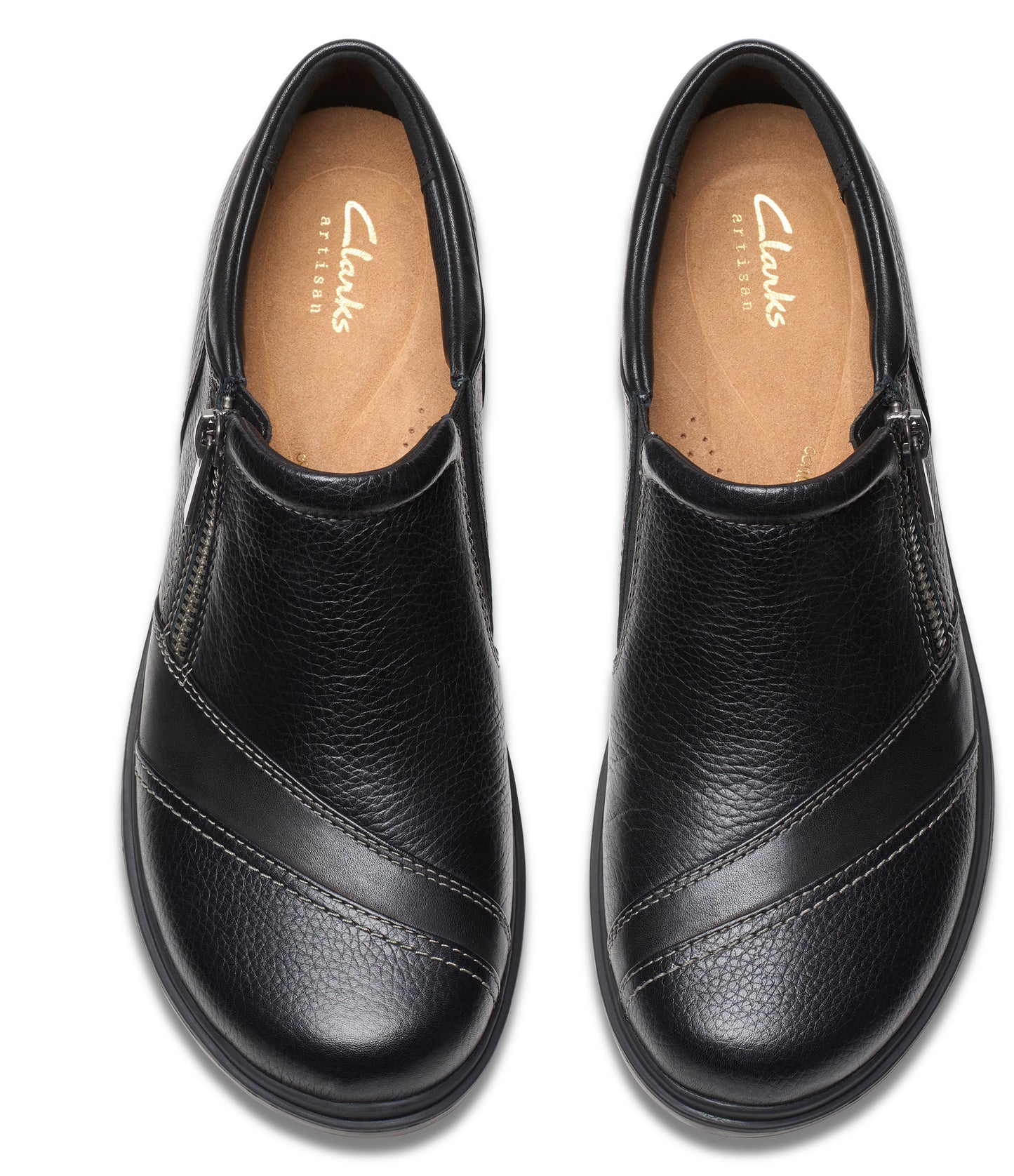 Pair of black leather shoes with visible side zipper.