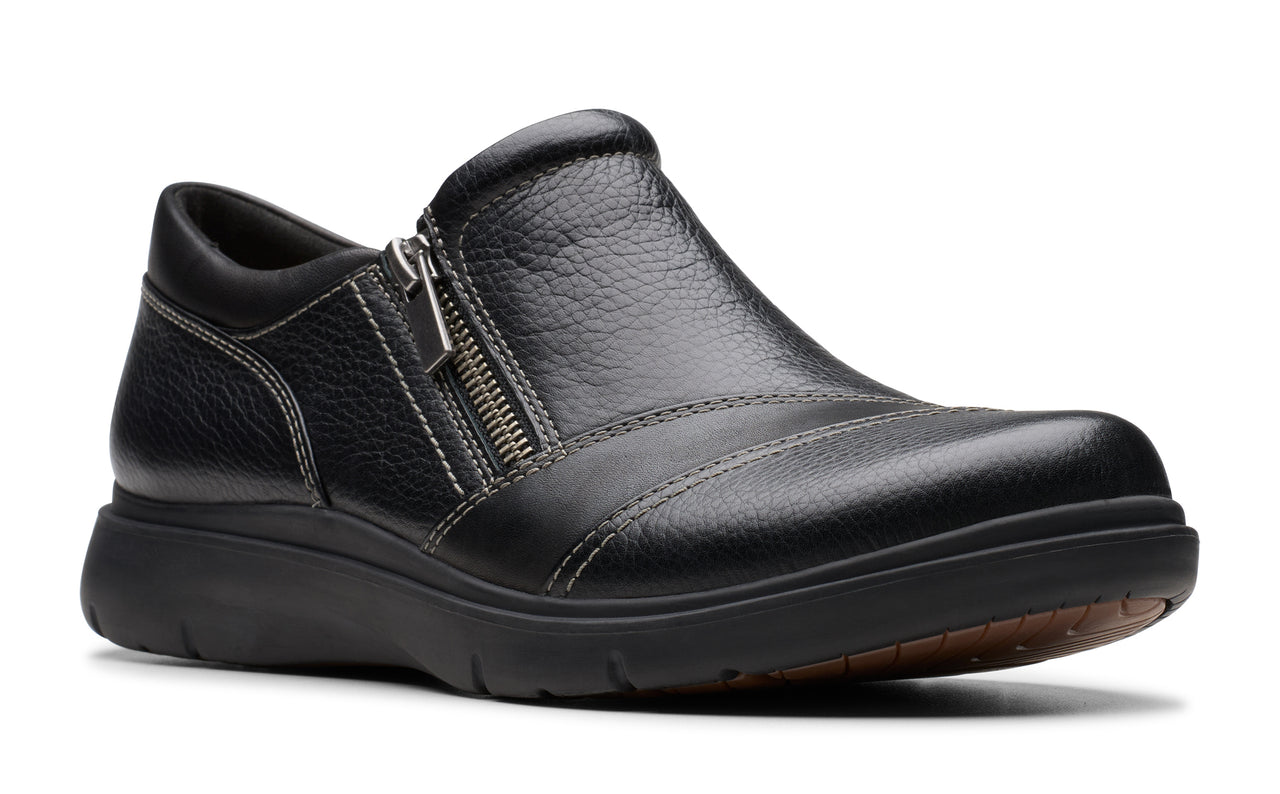 Black leather slip-on shoe with side zipper and dark sole.