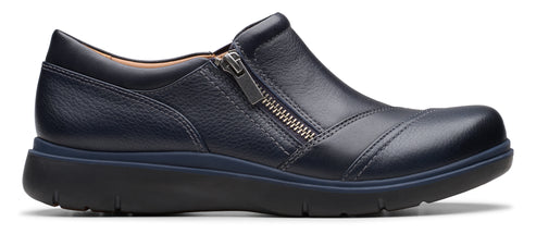A navy blue leather slip-on shoe with a zipper on the side.