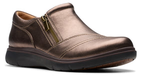 Metallic bronze slip-on shoe with a side zipper.