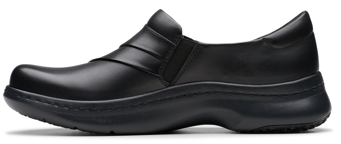 Black slip-on shoe with a round toe and a thick, flat sole.