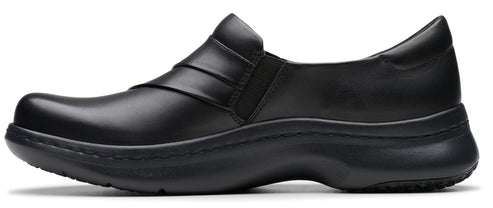 Black slip-on shoe with a round toe and a thick, flat sole.