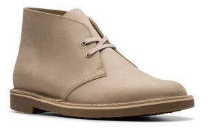 Beige leather desert boot with laces and crepe sole.