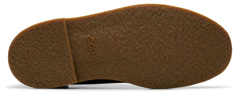 The underside of a brown shoe.
