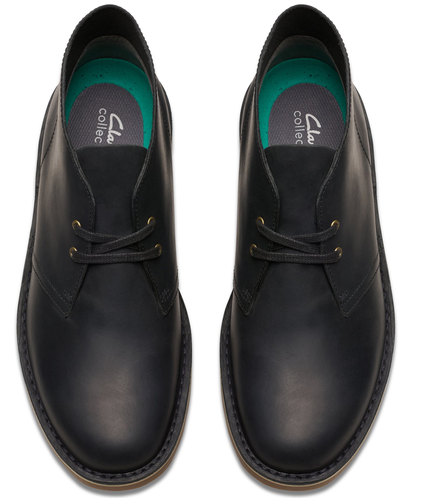 Overhead view of black leather ankle-high lace-up boots