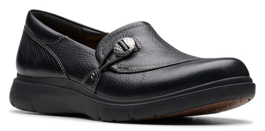 Black slip-on shoe with decorative button.
