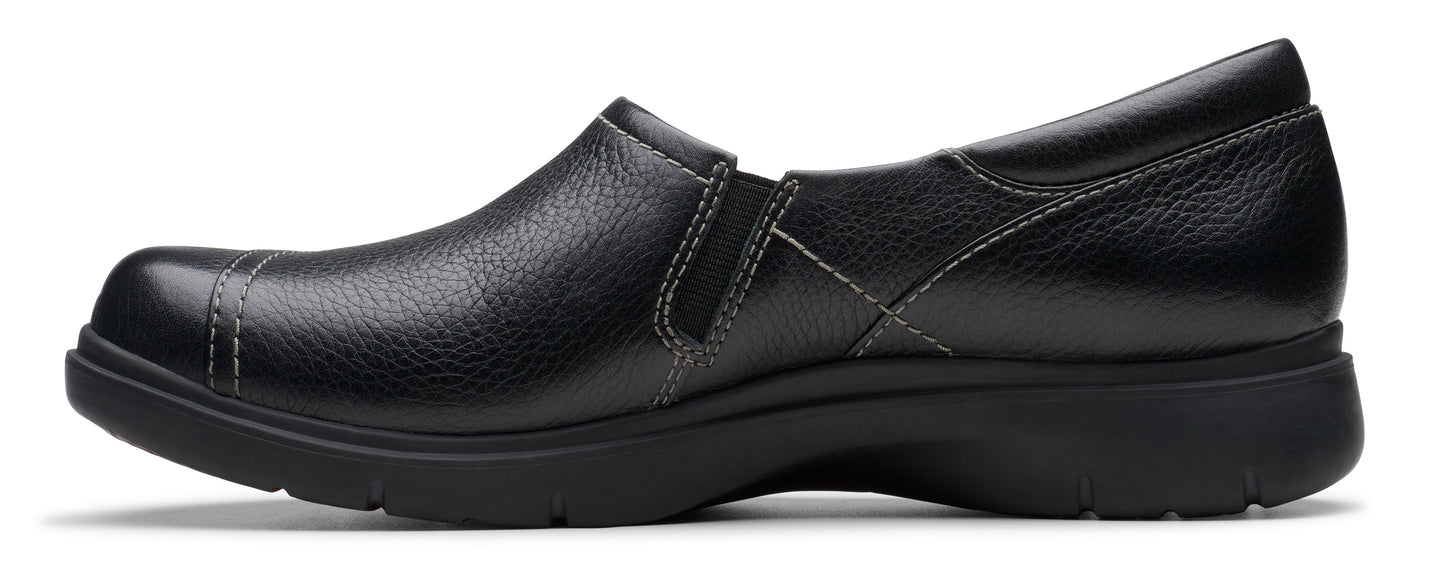Black leather slip-on shoe with round toe and low heel.