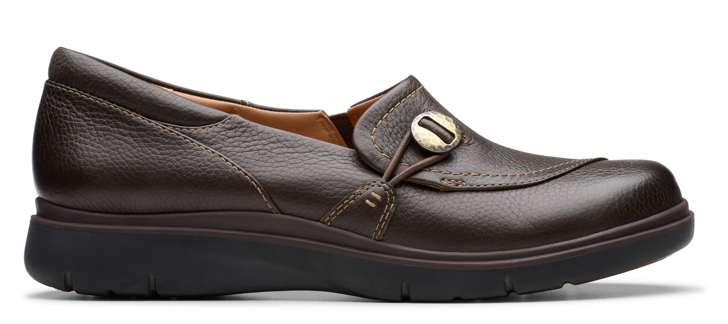 Brown leather slip-on shoe with decorative button.