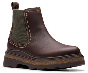 Brown ankle boot with elastic side panels and a chunky cork midsole.