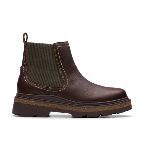 Brown leather ankle boot with olive green ribbed elastic side panel and brown lug sole.