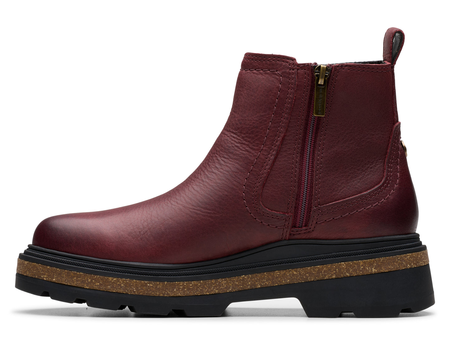 Burgundy leather ankle boot with zipper and cork and black platform sole.