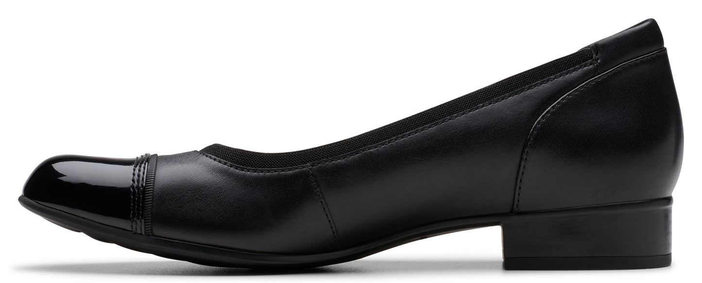 Black leather dress shoe with a shiny toe.