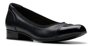 Black leather pump with patent leather toe.