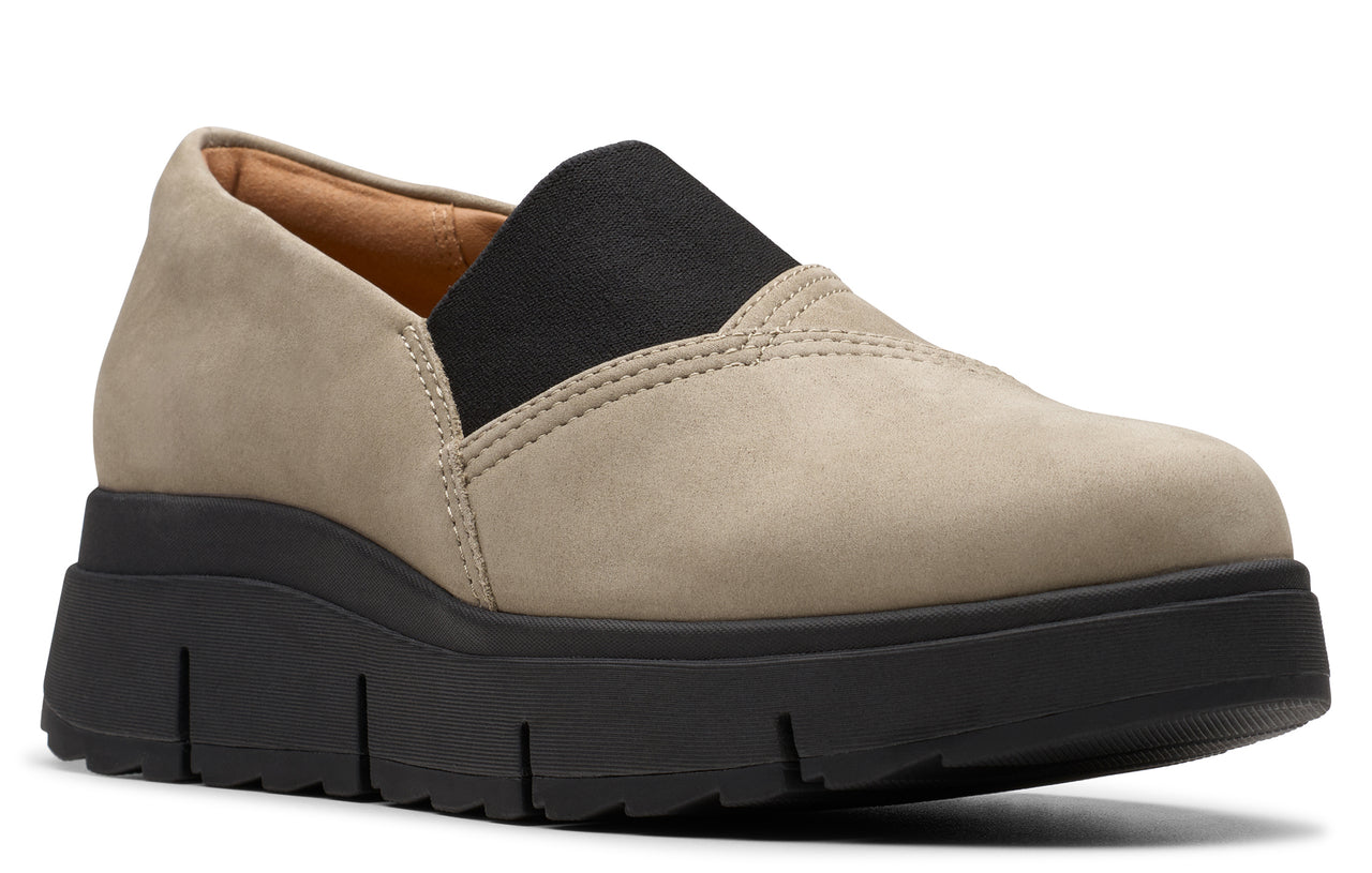 Slip-on platform shoe with a black elastic panel.