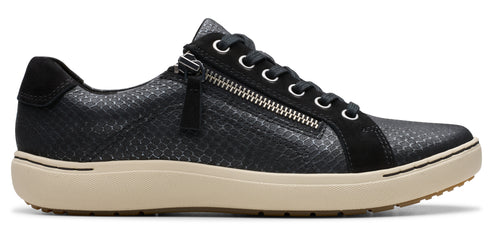 Black snakeskin sneaker with zipper and white sole.