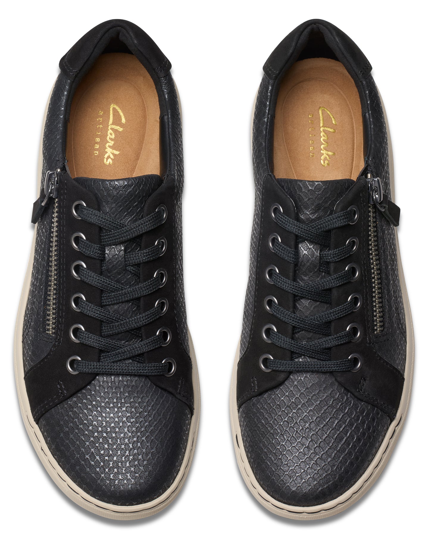 Overhead view of black reptile print lace-up sneakers with zippers.