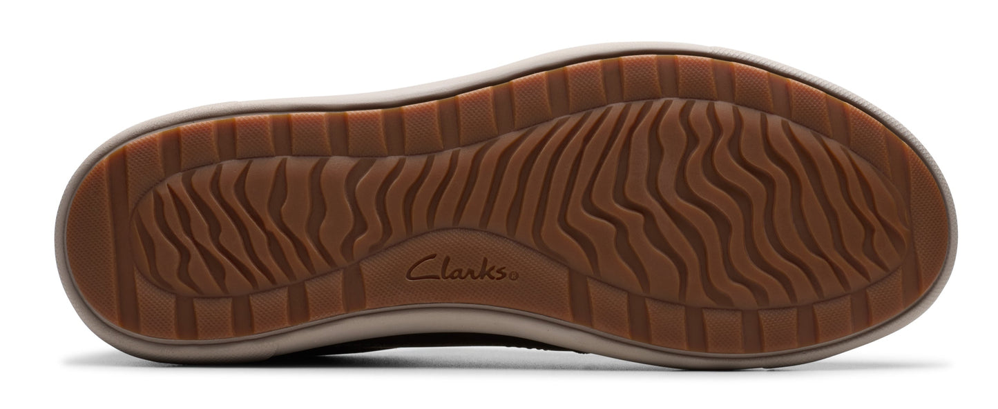 The sole of a shoe with wavy treads and the word "Clarks" visible in the center.