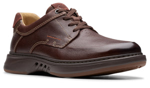 A brown leather casual shoe with brown laces and a dark brown rubber sole.
