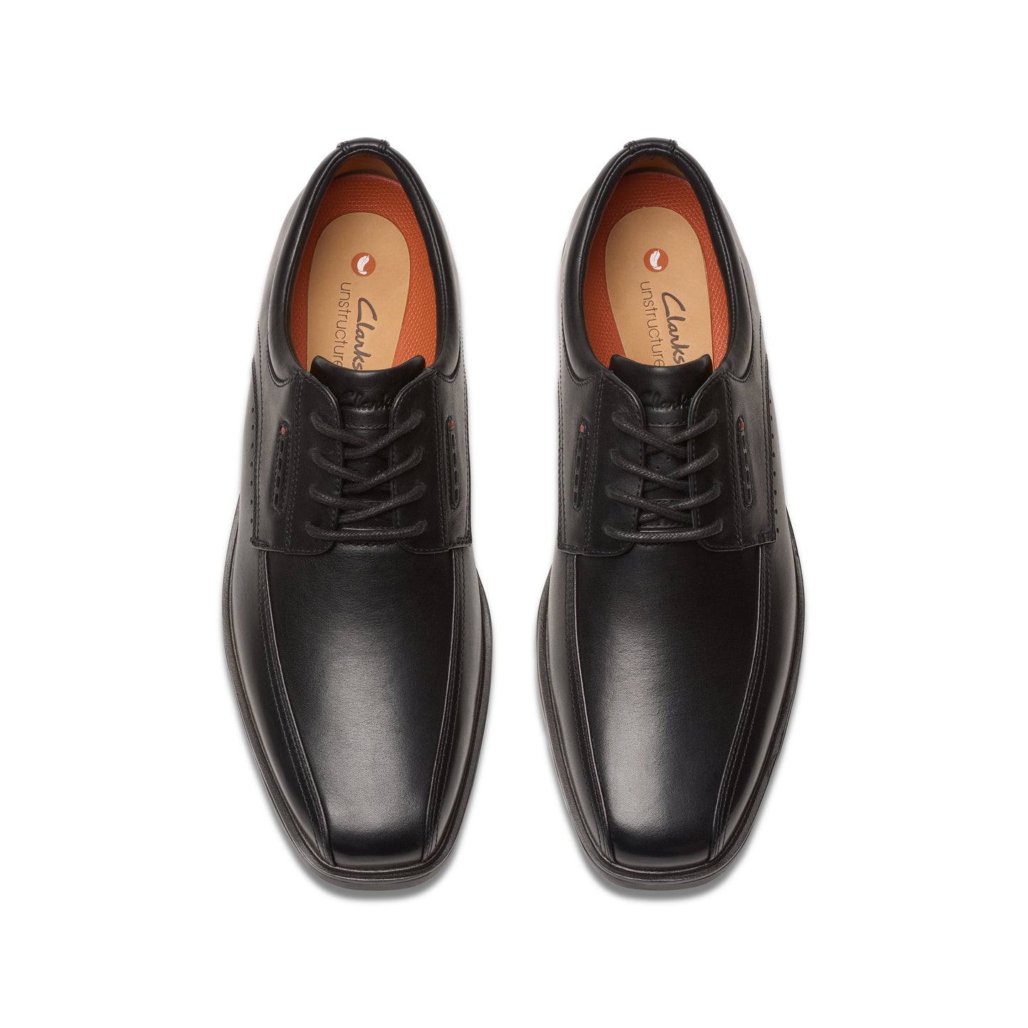 Pair of black leather dress shoes, lace-up closure, viewed from above.