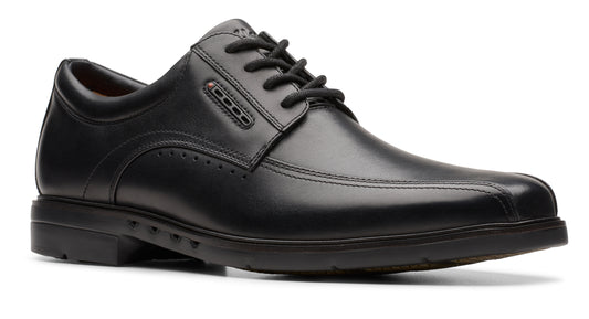 Black leather dress shoe with lace-up closure and a low heel.