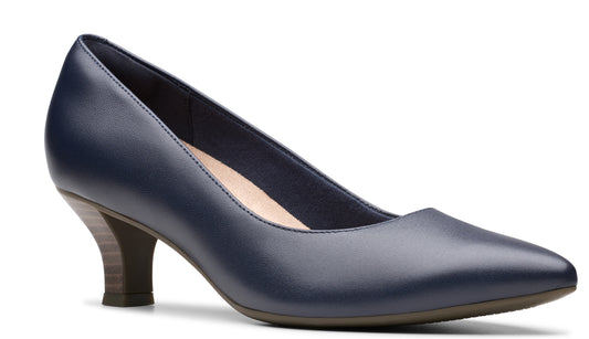 Navy blue leather pump shoe with a pointed toe and a short, curved heel.