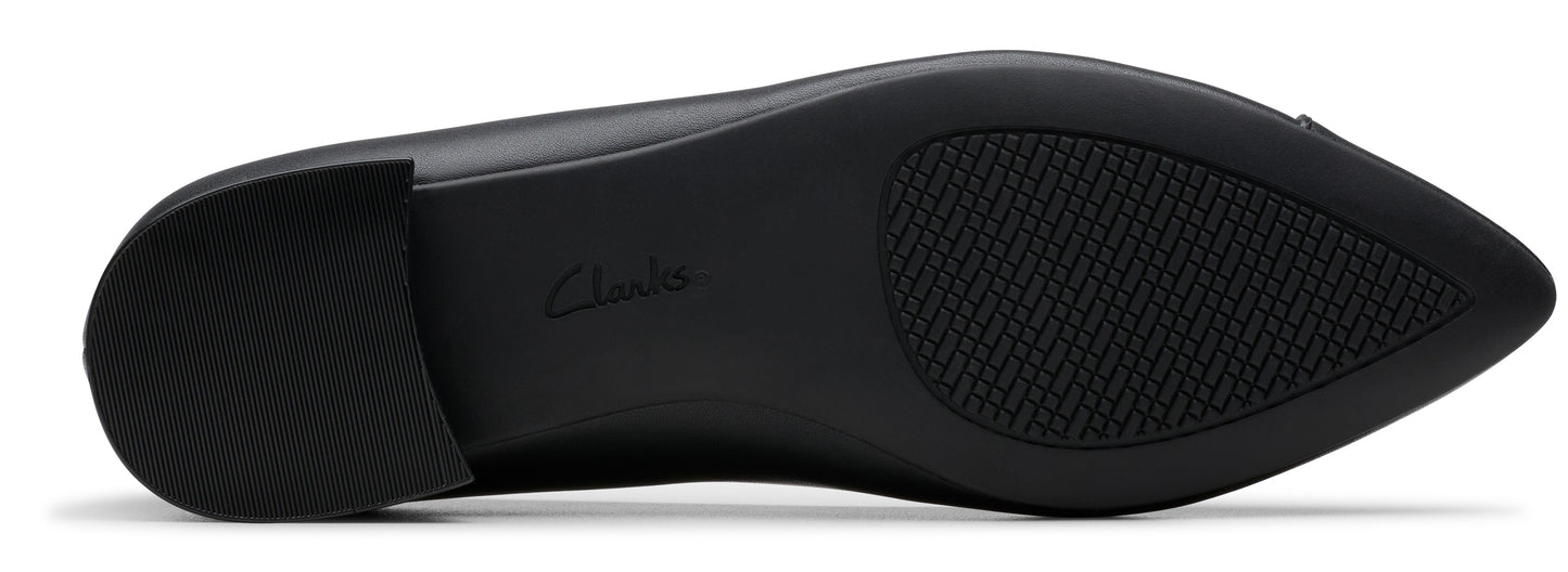 Bottom of a black shoe with a rubber sole.