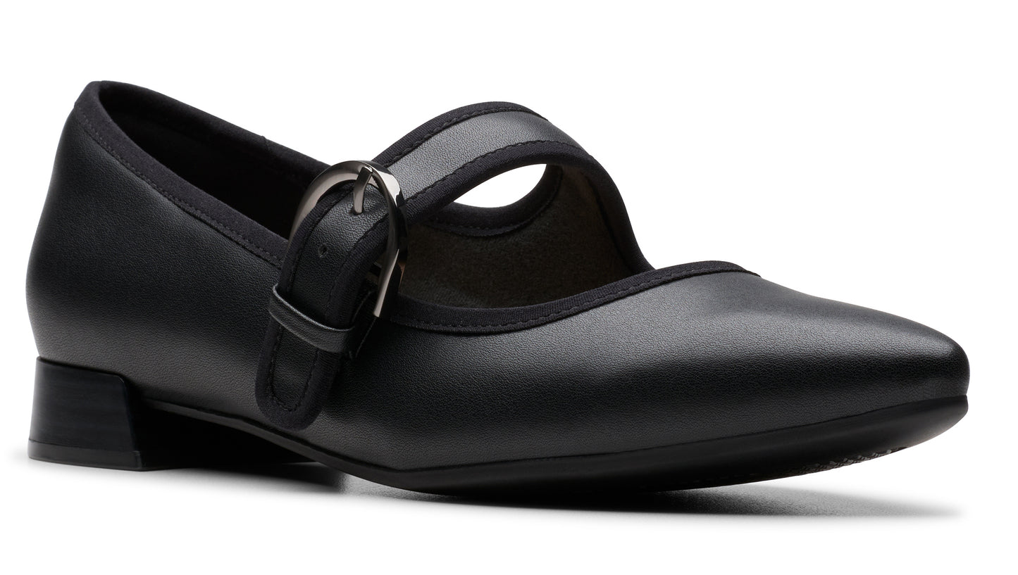 Black, leather Mary Jane shoe with a silver buckle and low block heel.