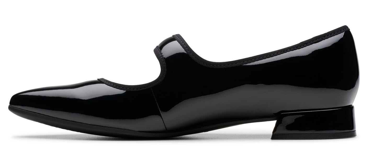 Black patent leather Mary Jane shoe with a low block heel.