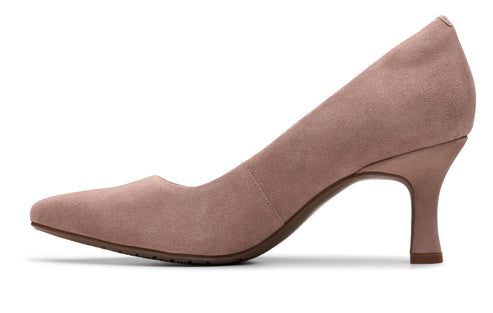Close-up of a women's pink suede high heel shoe.