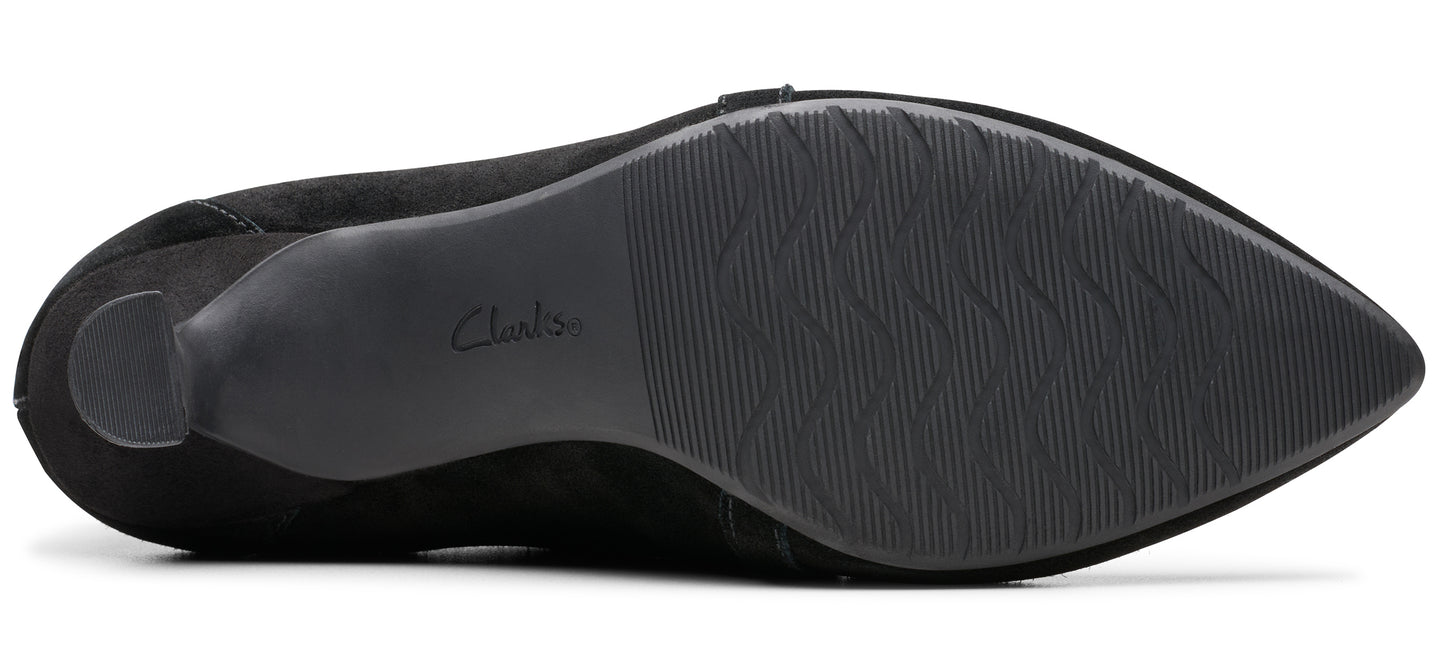 A shoe with a black sole.