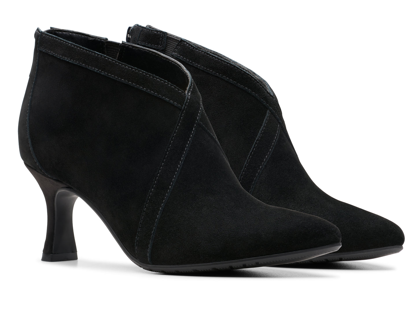 Pair of black suede ankle boots with pointed toes and flared heels.