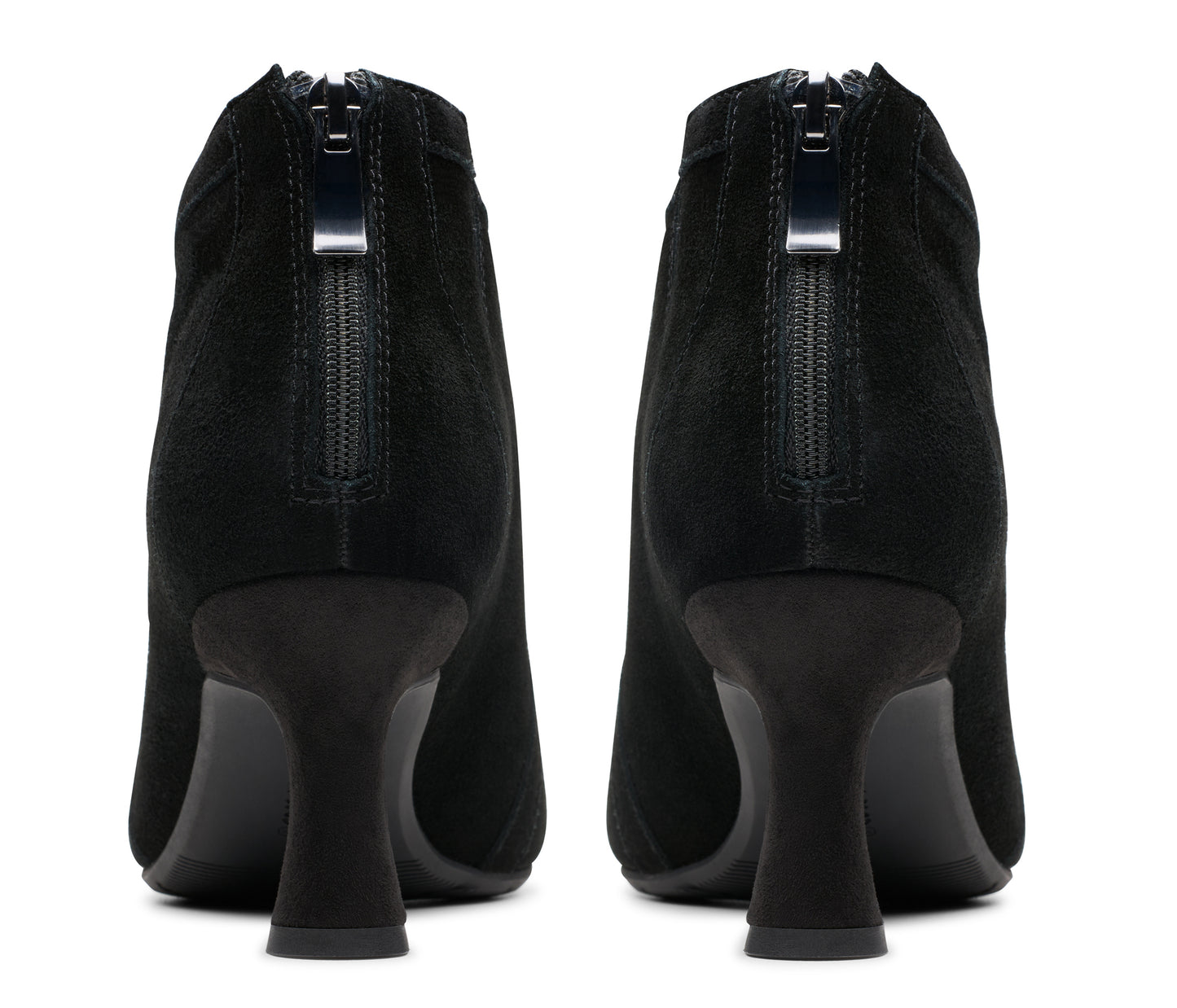Pair of black suede ankle boots with zipper on the back of the heel.