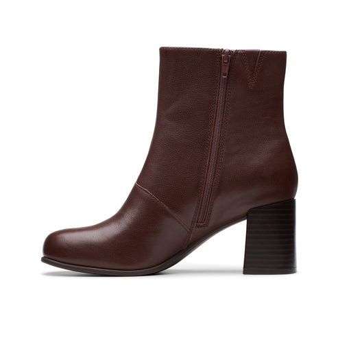 Brown ankle boot with block heel and side zipper.