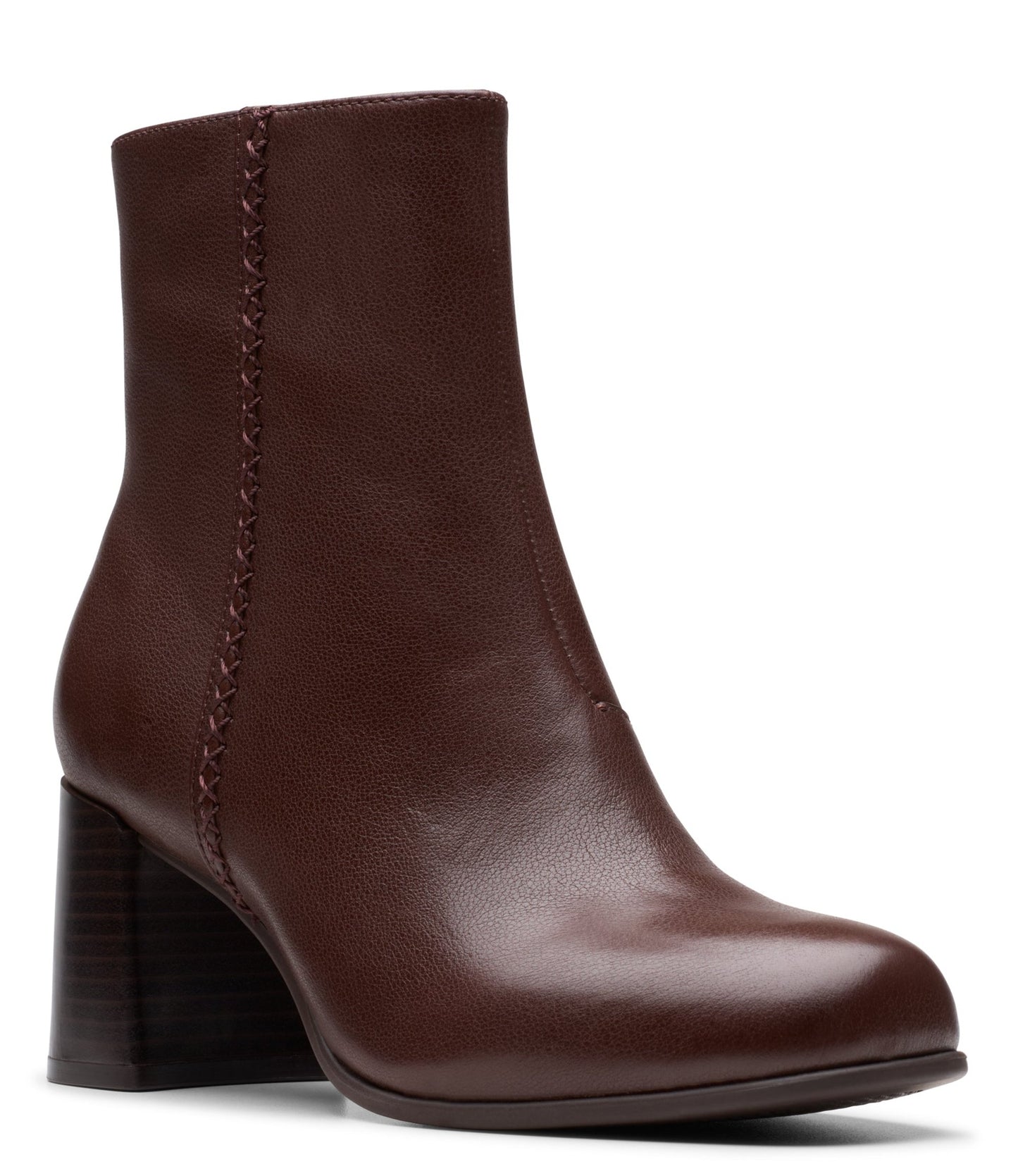 A shiny brown leather ankle boot with a block heel and decorative stitching on the outside ankle.