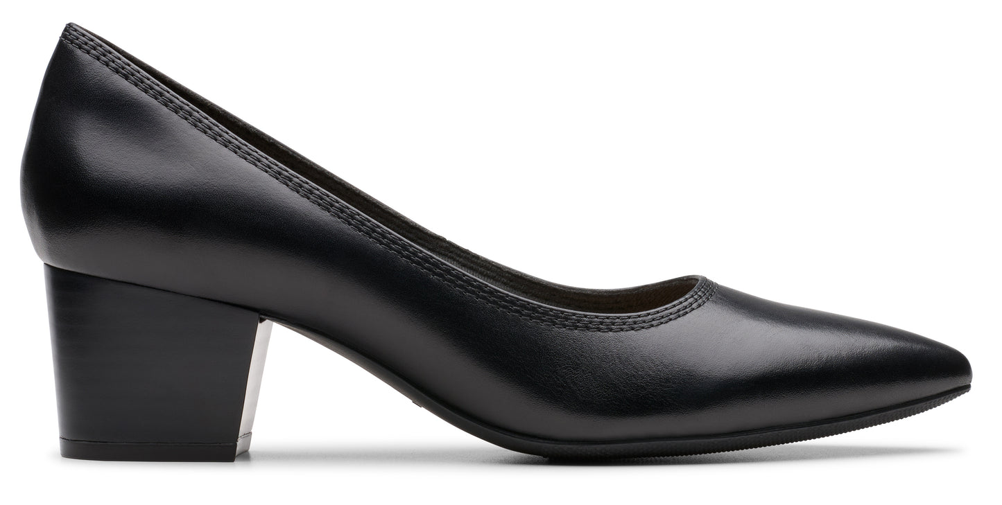 Black leather block heel pump shoe.