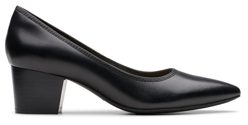 Black leather block heel pump shoe.