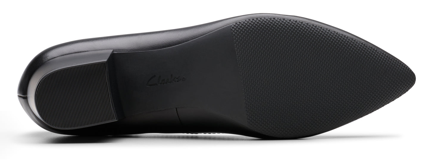 Black shoe sole with heel and pointed toe.