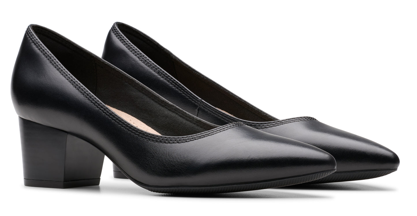 Pair of black leather mid-heel dress shoes with a pointed toe.