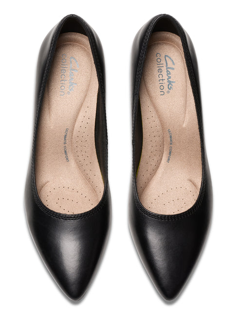 Pair of black pointed-toe dress shoes with "Clarks collection" printed on the insole.