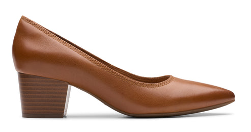 Brown leather heeled pump shoe with a block heel.