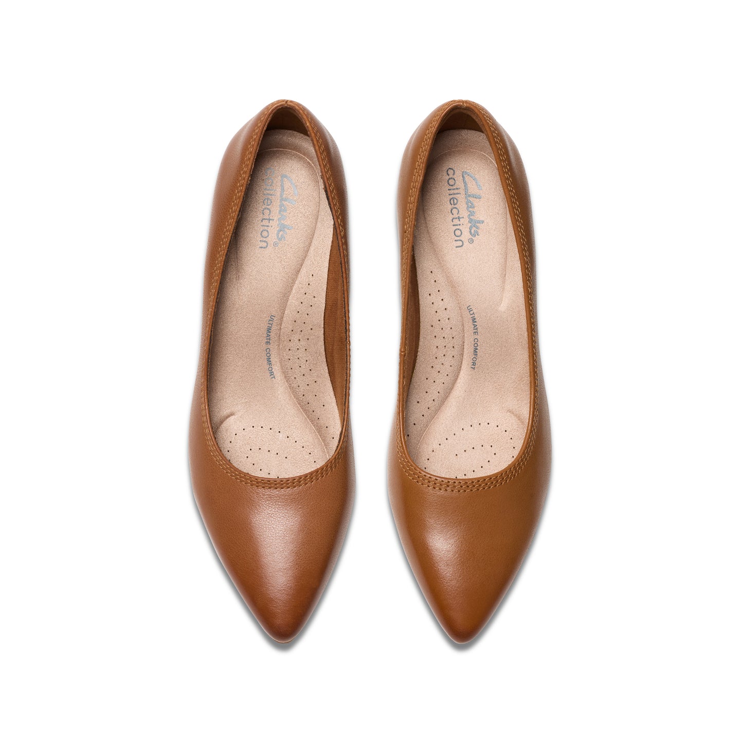 Pair of tan-colored, leather heeled pumps with pointy toes.