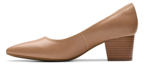 Tan leather pump with a block heel.