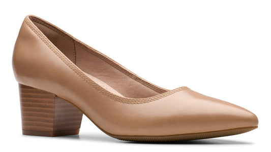 Tan-colored leather heeled dress shoe with a stacked heel.