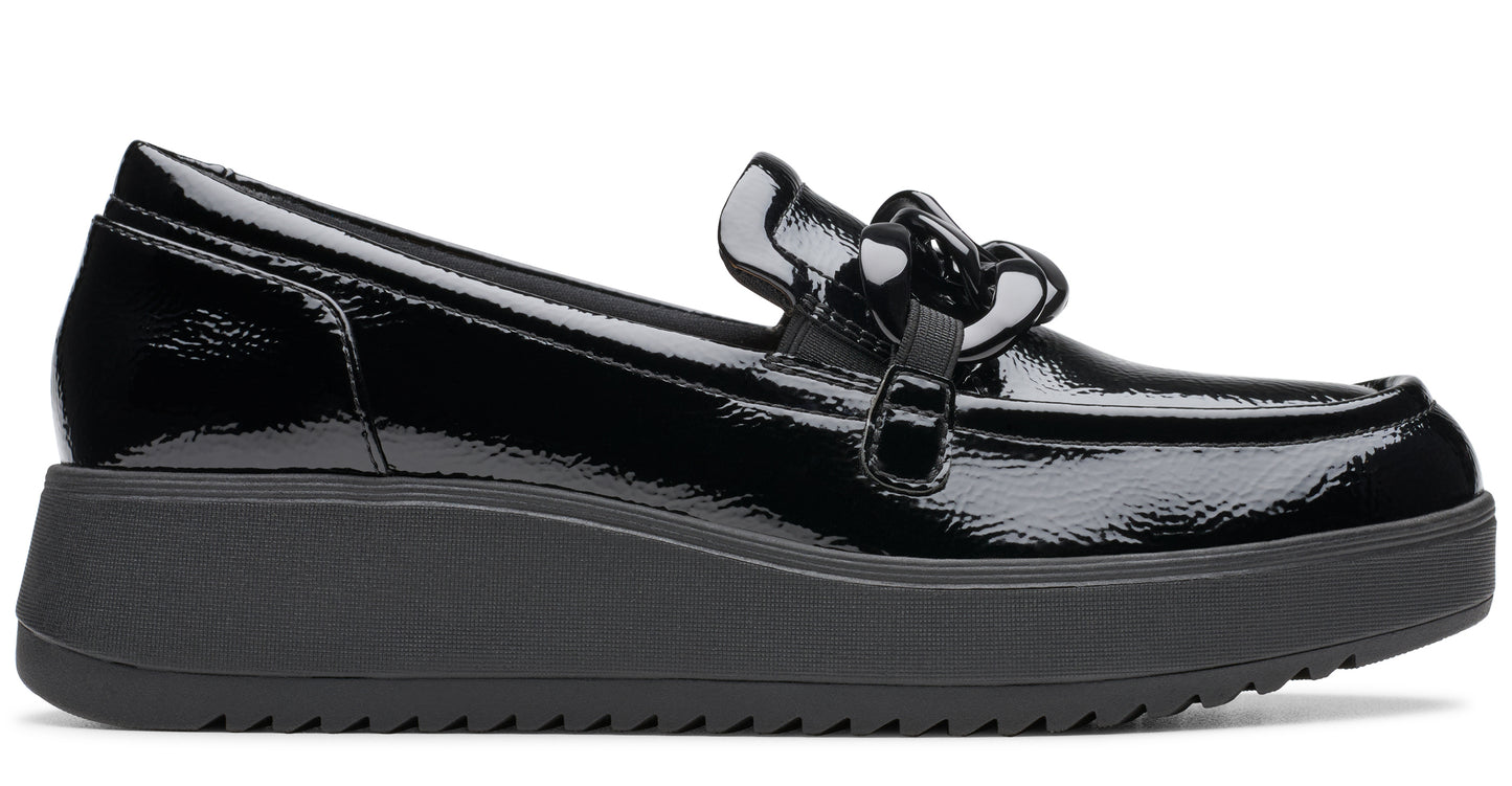 Black patent leather platform loafer with chain detail.