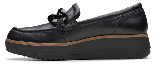 Black platform loafer with a chain.