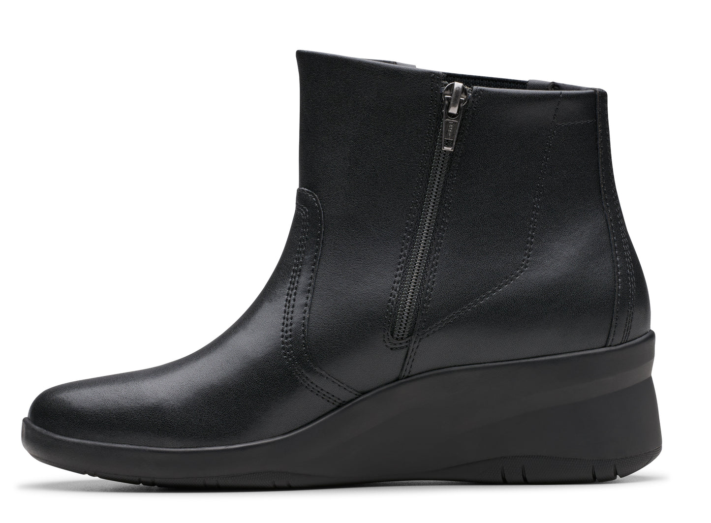 Black leather ankle boot with a wedge heel and side zipper.