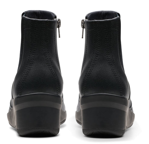 Pair of black ankle boots with zipper.