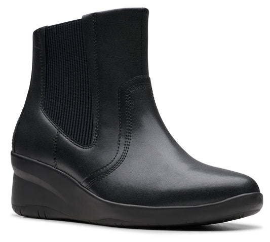 Black leather ankle boot with elastic side panel and wedge heel.